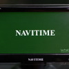 起動画面。おなじみの緑地に白のNAVITIMEロゴ。右下には“WND（Wireless Navigation Device）”の文字が。