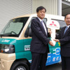三菱自動車の益子修社長（左）とヤマト運輸の木川眞社長（右）
