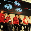 プレスブリーフィングで出展車を紹介する各ブランド担当者