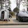 東日本大震災 街には被災したクルマが転がる