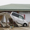 東日本大震災 冠水で道路が寸断されたままの石巻