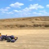 2012年開催に向けて建設が進むF1米国GPの荒野を行くレッドブルF1（動画キャプチャー）