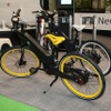パワーライド・ツーリング。一体型モータージェネレーター変換技術によって自己充電機能を実現。3つの走行モードで、電動原付（電気のみで自走）、電動アシスト自転車、自転車としてフレキシブルに走行可能。テストライド（12月7～11日開催）に提供（東京モーターショー11）。