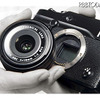 「FUJIFILM X-Pro1」のレンズ交換のイメージ（レンズは別売）