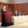 KDDI 田中孝司代表取締役社長（演壇）