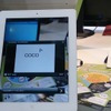 マーカーとして設定したチラシをアプリで読み取るとサービス紹介の動画が再生される