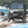 石巻で作業するウニモグ