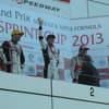GT300第1レースの表彰式。左から2位ビルドハイム、優勝の佐々木大樹、3位の小林崇志。