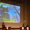 宇都宮市で2月19日に開かれたLRTに関するシンポジウム。後半のパネルディスカッションでは、宇都宮に実際に導入した場合を想定したCG映像も上映された