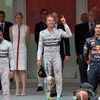 モナコGPの表彰台（左よりルイス・ハミルトン、ニコ・ロズベルグ、ダニエル・リチャルド）