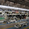 SPSセット場と組立ラインはAGV（無人搬送車）で結ばれる