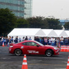 まるで遊園地のアトラクションのような盛り上がりをみせる、東京モーターフェス2015 with みんモー（10月10・11日、東京・青海）
